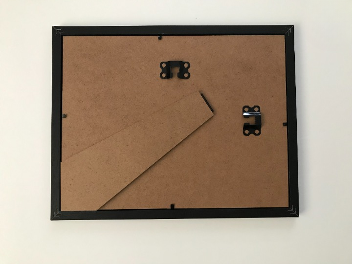 The back view of the picture frame for Say What Now? Cat wearing shades. 