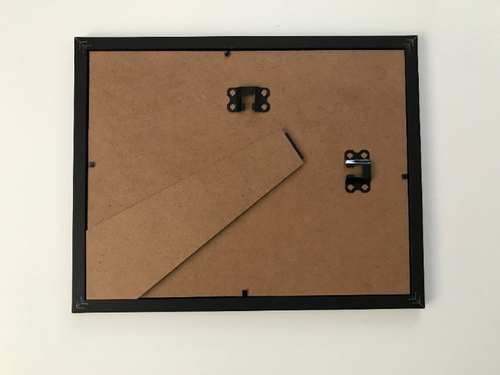 The back view of the picture frame for Say What Now? Cat wearing shades. 